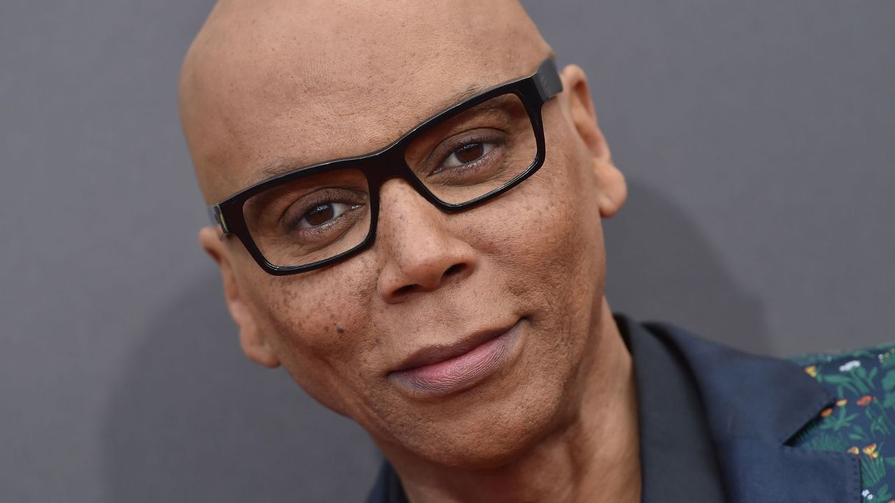 rupaul charles on a gray background