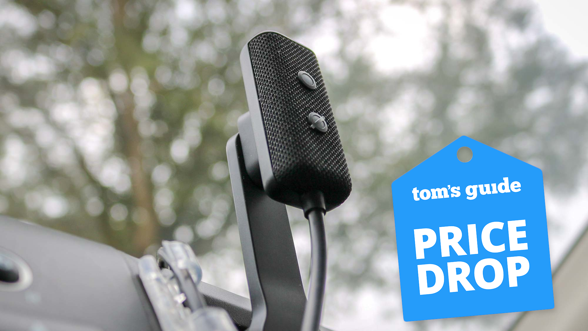 An Echo Auto (2nd Gen) mounted in a car with a Tom's Guide Price Drop deals badge