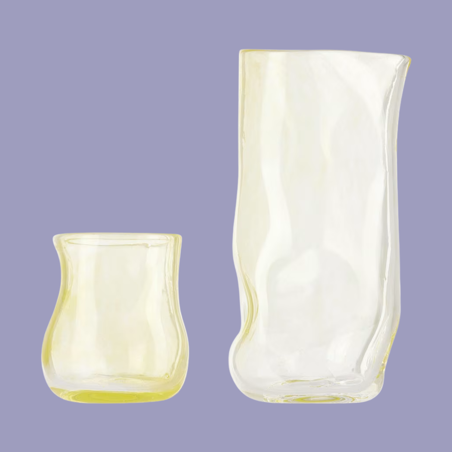 A textured yellow carafe and cup