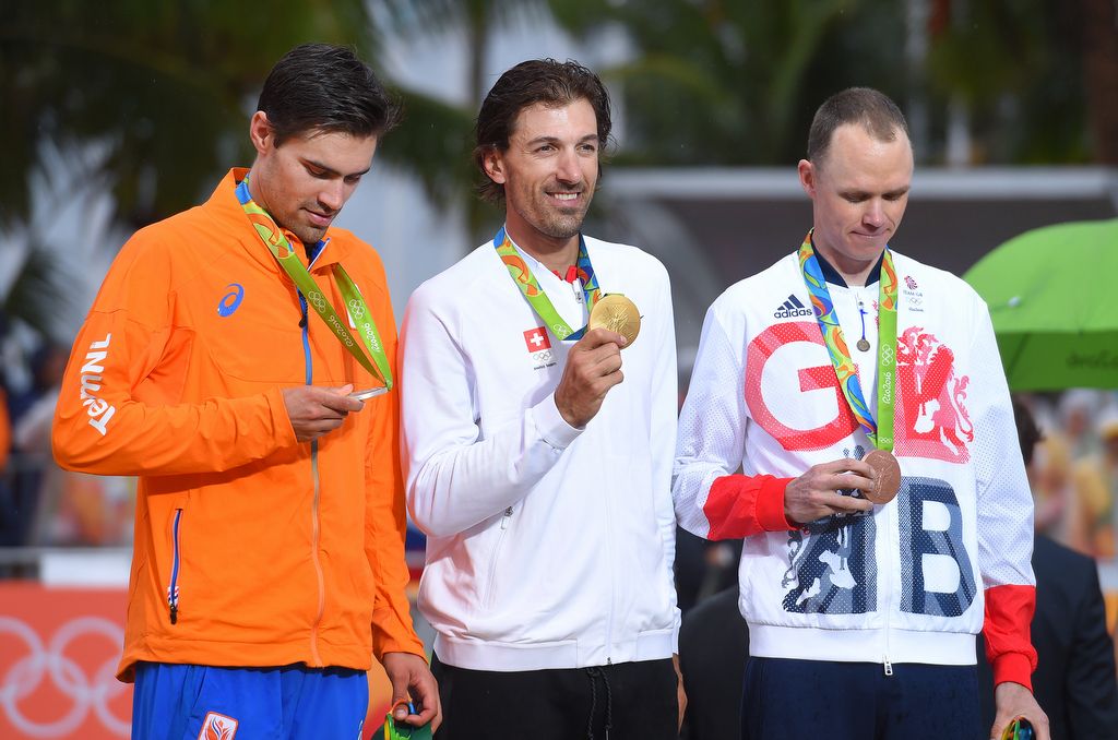 Tom Dumoulin (Netherlands) looks down at his silver medal