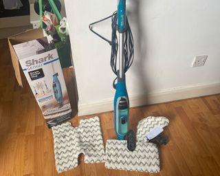 Image of Shark Genius Pocket Mop system being unboxed at home