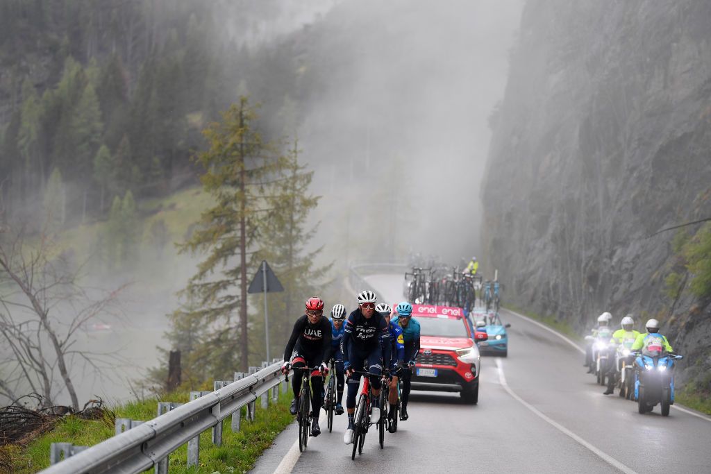 CORTINA DAMPEZZO ITALY MAY 24 Davide Formolo of Italy and UAE Team Emirates Joao Almeida of Portugal and Team Deceuninck QuickStep Antonio Pedrero Lopez of Spain and Movistar Team Gorka Izagirre Insausti of Spain and Team Astana Premier Tech Vincenzo Nibali of Italy and Team Trek Segafredo in breakaway during the 104th Giro dItalia 2021 Stage 16 a 153km stage shortened due to bad weather conditions from Sacile to Cortina dAmpezzo 1210m Rain Fog girodiitalia Giro on May 24 2021 in Cortina dAmpezzo Italy Photo by Tim de WaeleGetty Images
