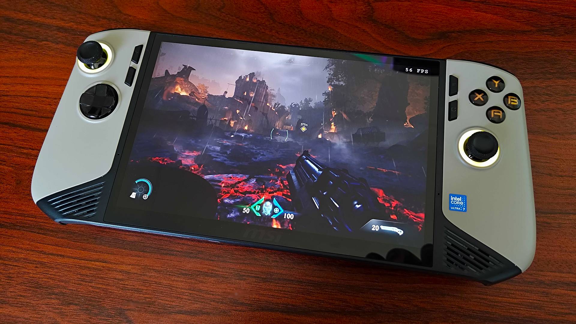 MSI Claw 8 AI+ handheld with DOOM: The Dark Ages gameplay on screen.