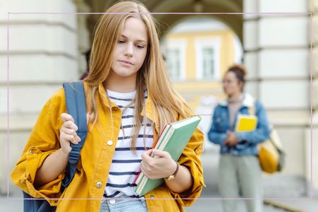 Disappointed teenage girl after collecting exam results