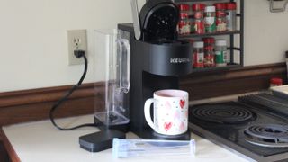 image showing how to prep keurig coffee machine for cleaning with vinegar