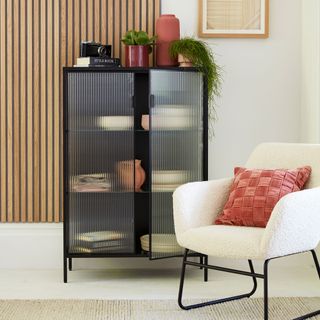 Living room storage cabinet with fluted doors