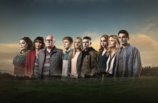 Emmerdale promotional shot featuring Mandy Dingle, Chas Dingle, Paddy Kirk, Noah Dingle, Amelia Spencer, Samson Dingle, Chloe Harris, Charity Dingle and Mackenzie Boyd