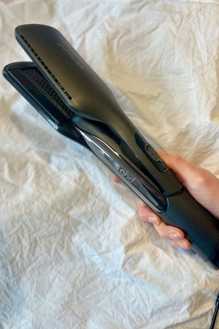 Katie holding the ghd Duet 2-in-1 Hot Air Styler