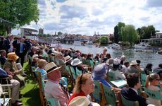 Spectators line the riverbank watching the racing at Henley Regatta. Image shot 07/2010. Exact date unknown.