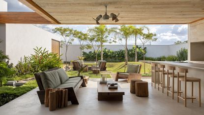 The covered terrace at the house by Solange Calio