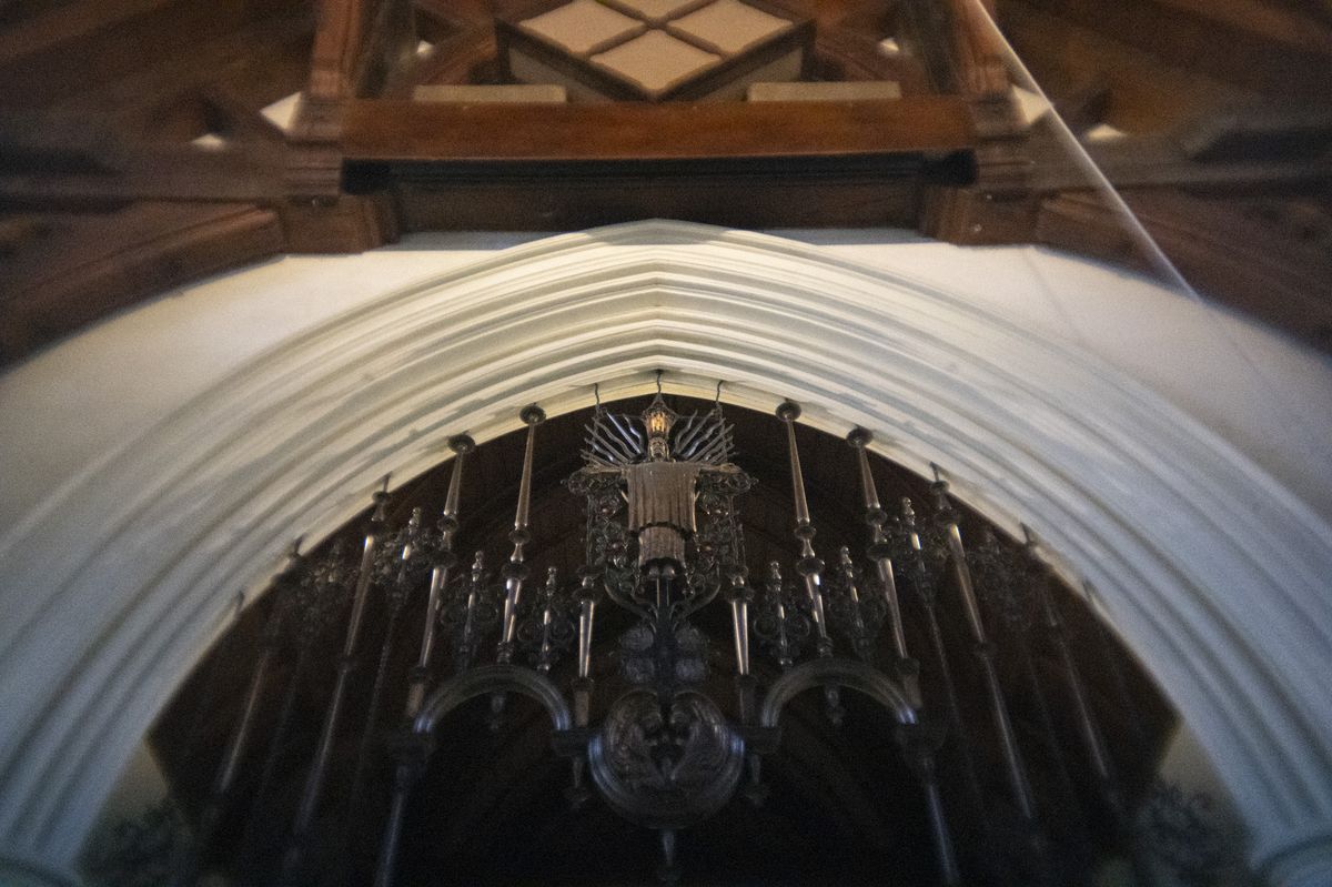 The arches to an altar inside an old Anglican church in the UK