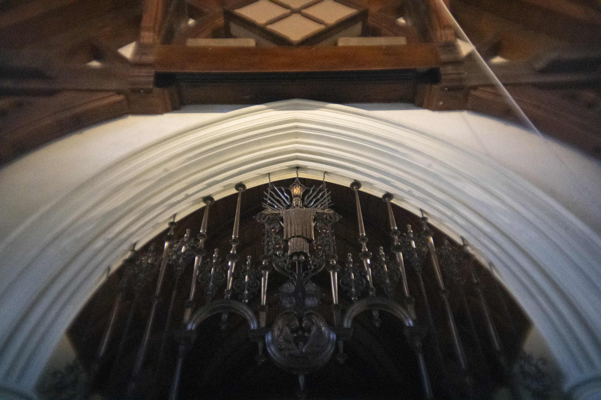 The arches to an altar inside an old Anglican church in the UK