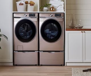 A washer dryer combo in a traditional kitchen