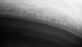 Here, the iconic waves appear on Saturn.
