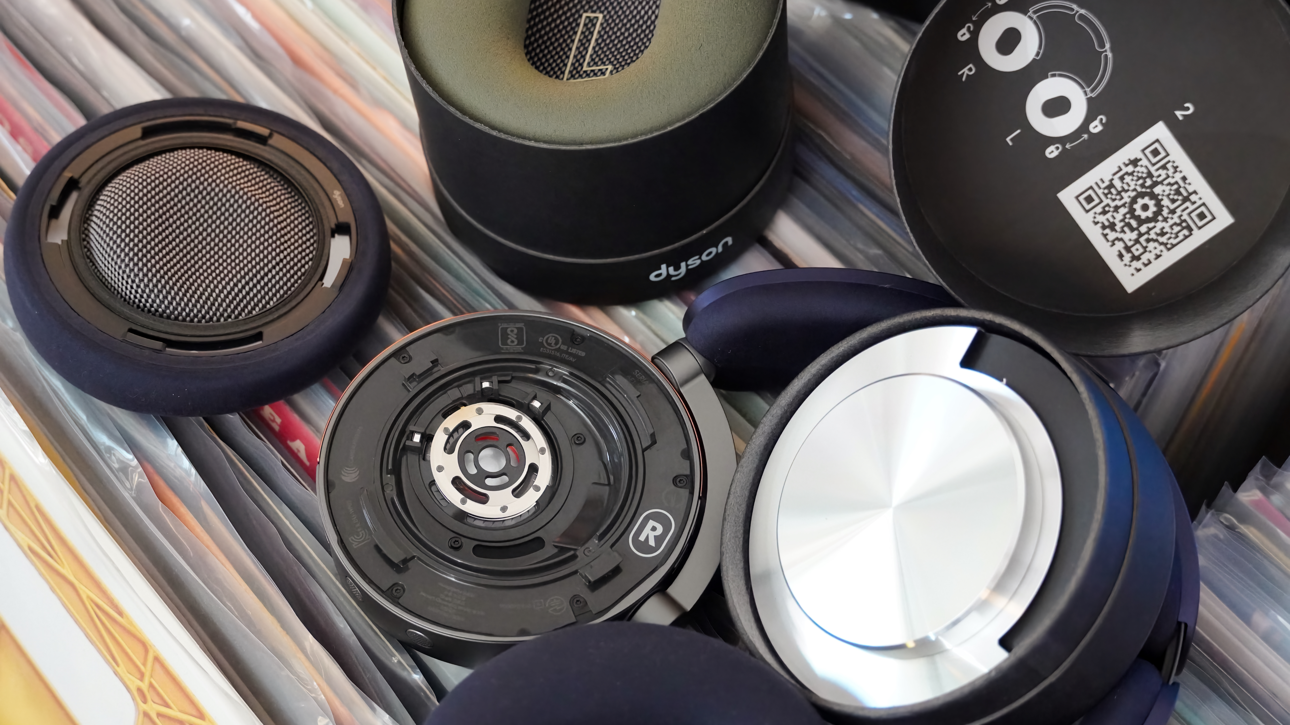 The Dyson OnTrac headphones with a mix of silver and copper caps.