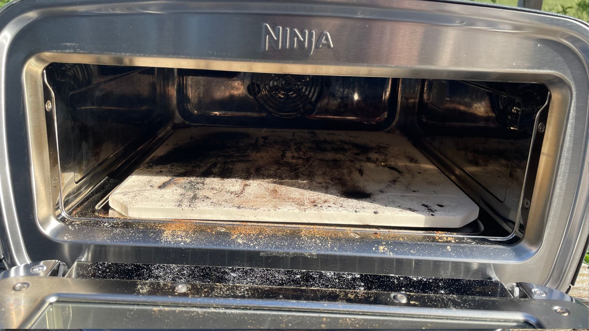 Ninja Artisan Electric Outdoor Pizza Oven and Air Fryer pizza stone