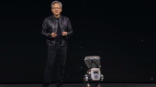 Jensen Huang next to AI robot on stage at GTC 2024