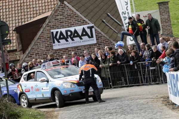 A slight hold up for the Lotto - Belisol team car