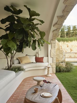 garden shade ideas with stone grotto by Wyer & Co