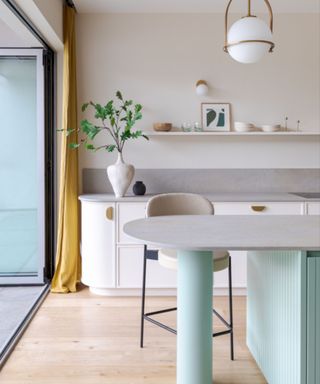 Kitchen with curved edges on the countertops and kitchen island