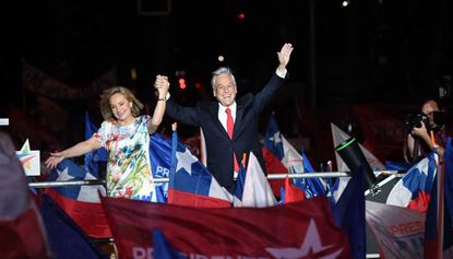 Sebastian Pinera celebrates being returned to power in Chile