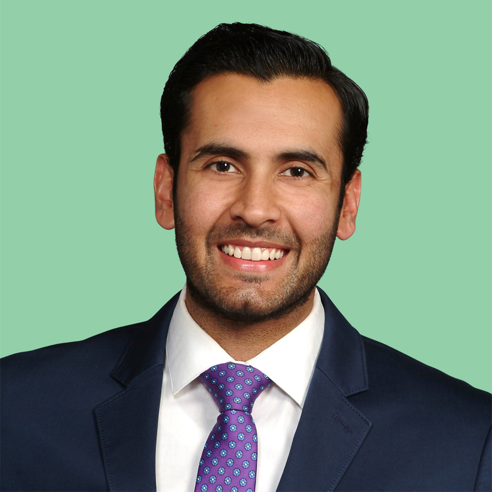 Dr. Jovi Boparai against a green background