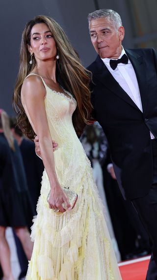 Amal Alamuddin Clooney and George Clooney attend the "Wolfs" red carpet during the 81st Venice International Film Festival on September 01, 2024 in Venice, Italy.