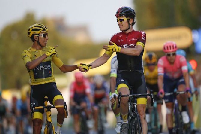 2019 Tour de France winner Egan Bernal and Team Ineos teammate Geraint Thomas – the 2018 winner – celebrate victory on the Champs-Elysées in Paris