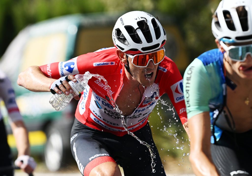 GRANADA SPAIN AUGUST 25 Ben OConnor of Australia and Team Decathlon AG2R La Mondiale Red Leader Jersey cools down during the La Vuelta 79th Tour of Spain 2024 Stage 9 a 1785km stage from Motril to Granada UCIWT on August 25 2024 in Granada Spain Photo by Dario BelingheriGetty Images