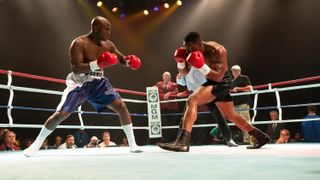Johnny Alexander as Evander Holyfield and Trevante Rhodes as Mike Tyson fighting in MIke
