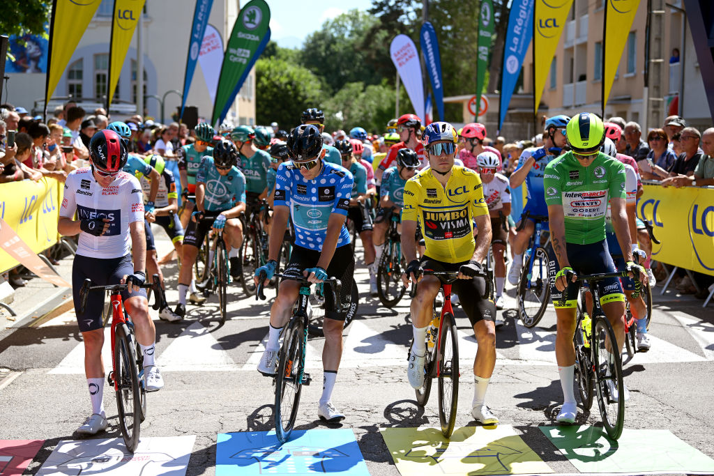 GAP FRANCE JUNE 10 LR Ethan Hayter of United Kingdom and Team INEOS Grenadiers White Best Young Rider Jersey Pierre Rolland of France and Team BB Hotels PB KTM Polka Dot Mountain Jersey Wout Van Aert of Belgium and Team Jumbo Visma Yellow Leader Jersey and Hugo Page of France and Team Intermarch Wanty Gobert Matriaux Green Points Jersey prior to the 74th Criterium du Dauphine 2022 Stage 6 a 1964km stage from Rives to Gap 742m WorldTour Dauphin on June 10 2022 in Gap France Photo by Dario BelingheriGetty Images