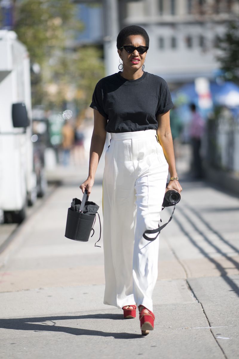 A Black Short-Sleeve Top and White Pants