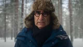 Eugene Levy bundled for winter and looking miserable