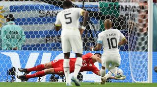 Andre Ayew sees his penalty saved by Sergio Rochet in Ghana's World Cup 2022 clash against Uruguay.