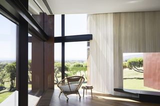 The living space interior featuring Victorian ash panelling and glazed openings