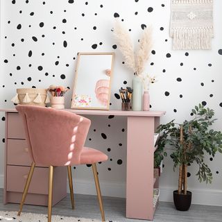 white dressing room pink desk and velvet chair vinyl wall stickers pampas grass mirror