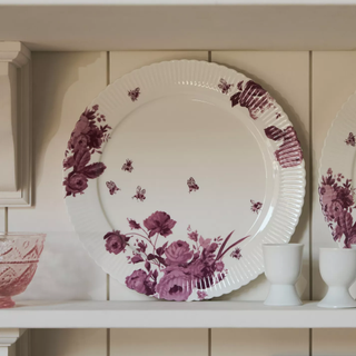 white dinner plate with purple floral details