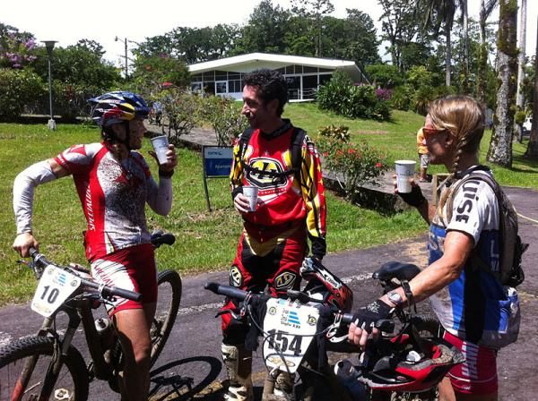 Rebecca Rusch, lead moto driver Federico Escalante and Louis Kobin (Global Biorhythm Events) chat after the race