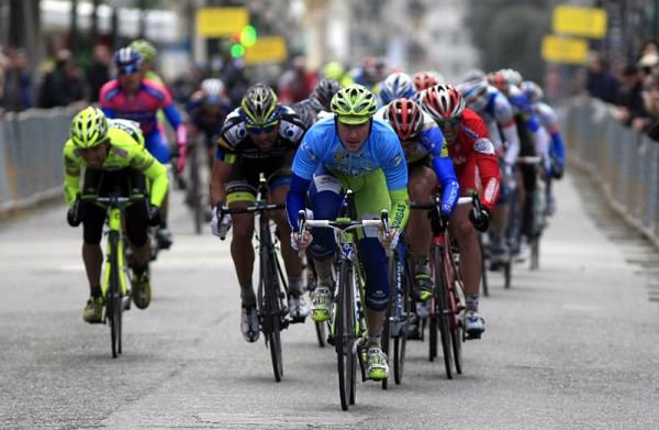 Race leader Elia Viviani (Liguigas-Cannondale) winds up his final kick to the finish line.