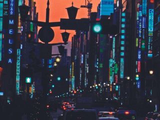 Colourful picture of a Japanese city at sunset.
