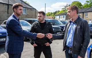 Robert and Aaron visit a car dealership in Emmerdale
