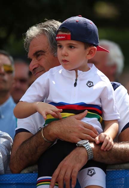 A fan watches the 2013 road race go by