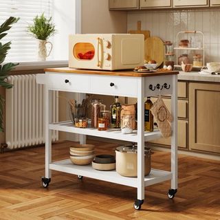 White kitchen island with microwave