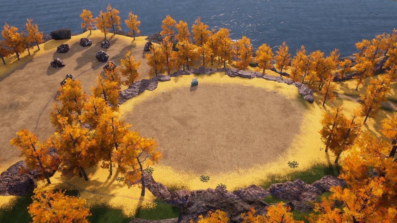 A yellow and red, autumn-like biome in Palworld that's mostly cleared out.