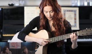 Gretchen Menn plays a Martin SC-10 acoustic