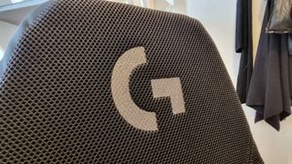 The "G" logo on the fabric of the Logitech Playseat Challenge X
