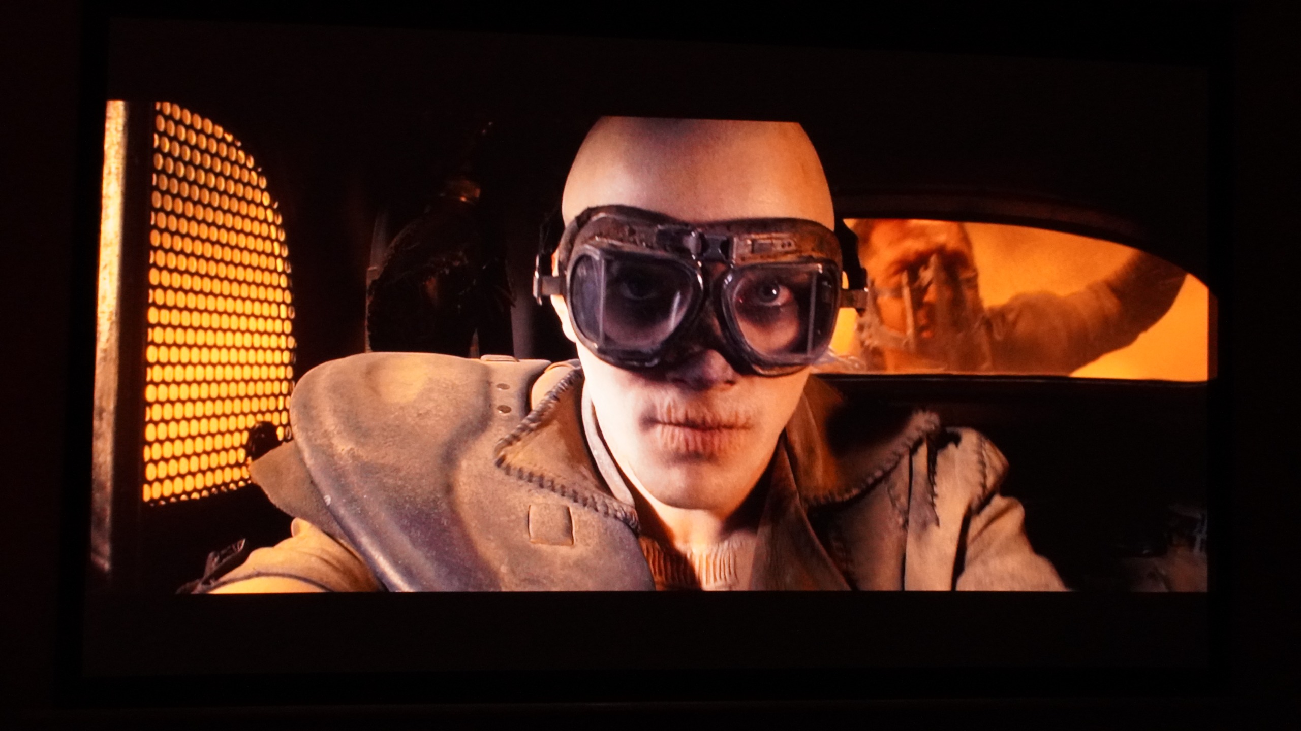 A projection of a scene from Mad Max.