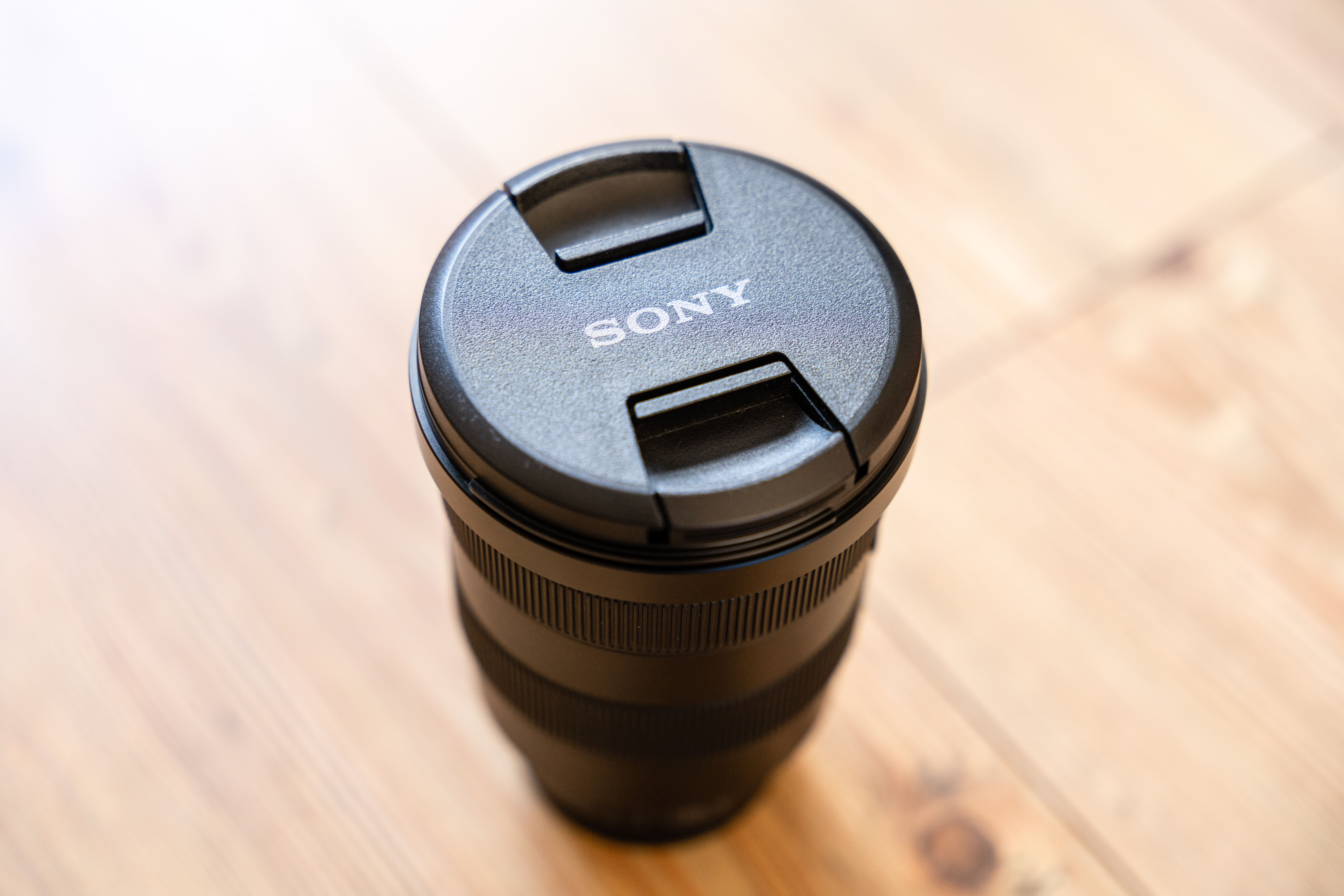 a camera lens with a lens cap on