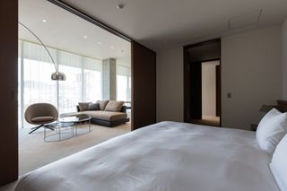 Bedroom of Marufukuro, a Kyoto hotel by Plan Do See and Tadao Ando