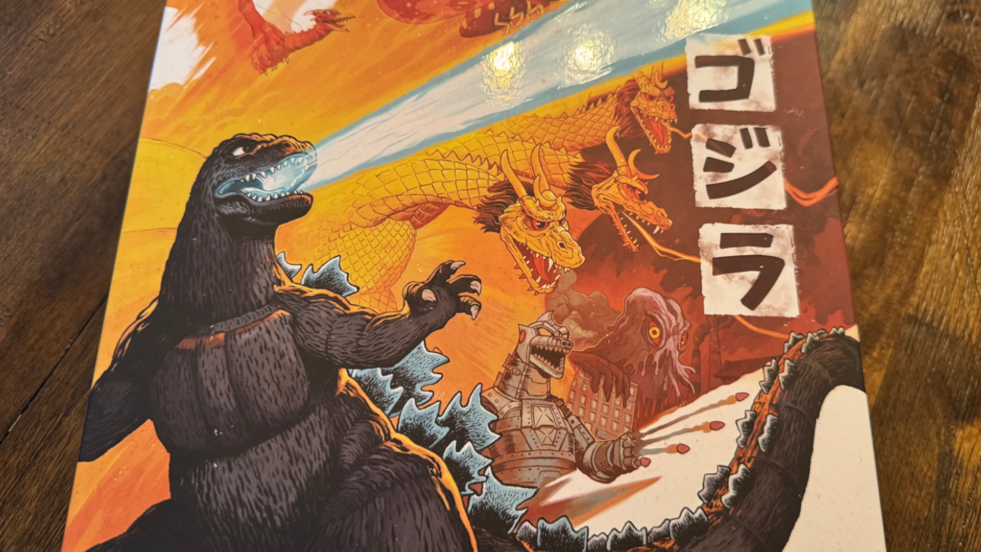 Artwork from the King of Tokyo: Godzilla box showing Godzilla firing atomic breath